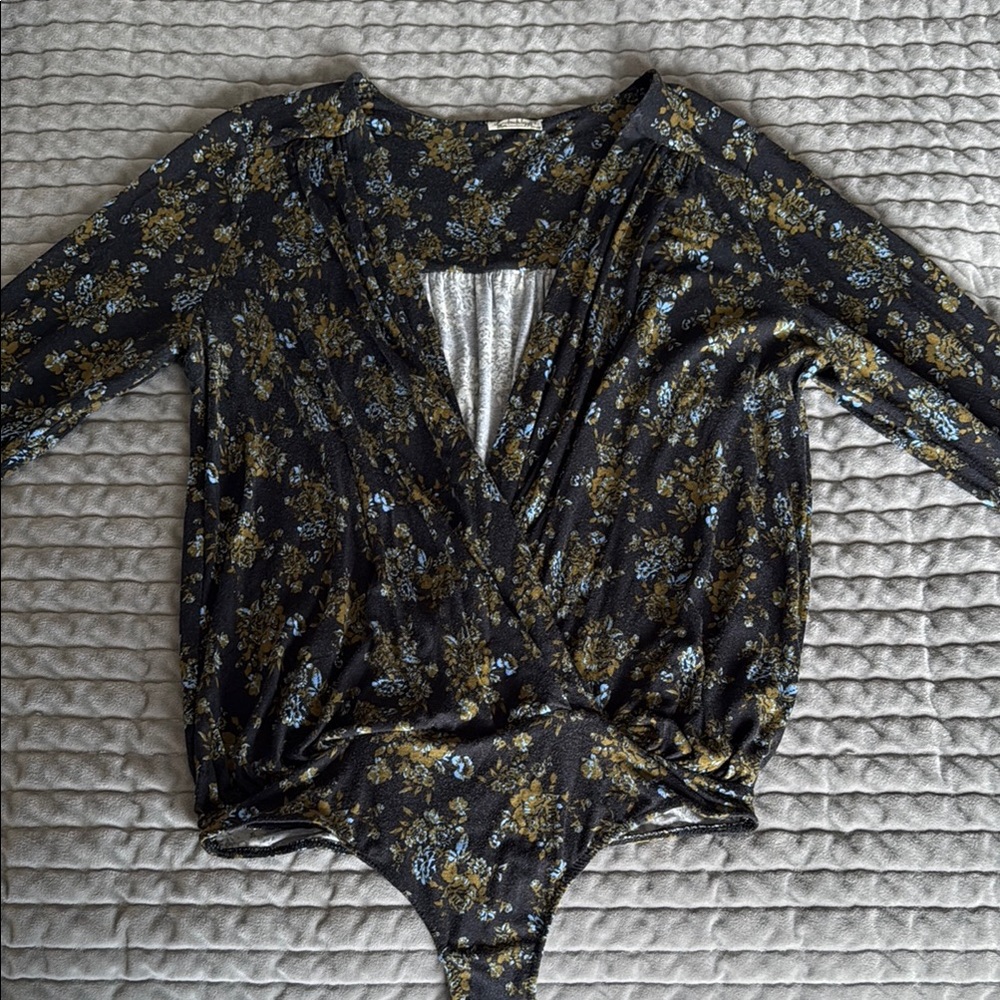 Free People Black and Gold Cut Out Bodysuit